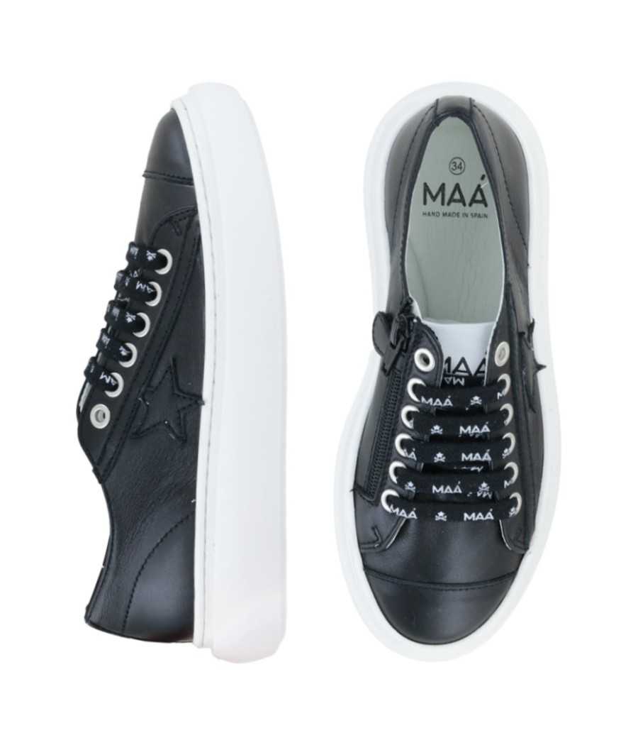 Sneakers black leather| Manuela de Juan